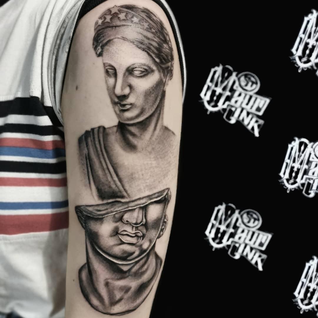 tattoo statue
